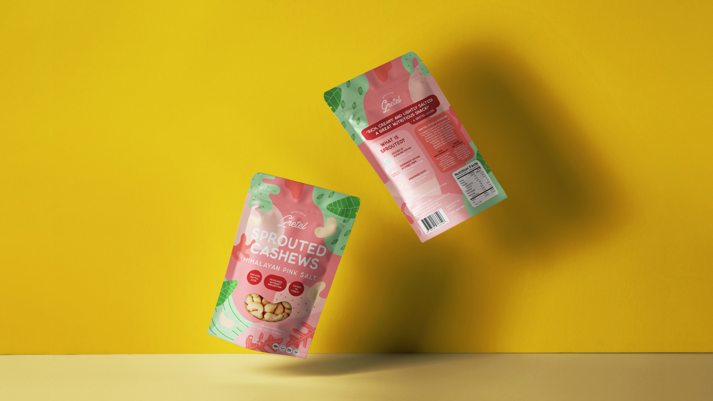 Two colorful pouches of With Love, Gretel Sprouted Cashews packaging designed by Sandra Tay with Himalayan Pink Salt are displayed against a yellow background, one facing forward showing the product and one showing the back label.