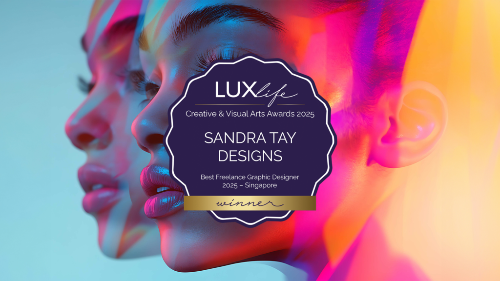 Two artfully lit faces in profile are shown in vibrant colors. A central badge reads: LUXlife Creative & Visual Arts Awards 2025, SANDRA TAY DESIGNS, Best Freelance Graphic Designer 2025 – Singapore, winner.